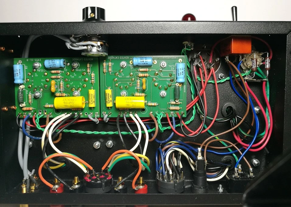 Bottom view of the Model 1955 Gen2 vacuum-tube amplifier with the chassis cover removed, showing the two printed circuit boards.