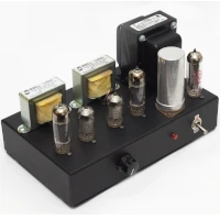 Model 1955 vacuum tube amplifier with exposed tubes and Transformers